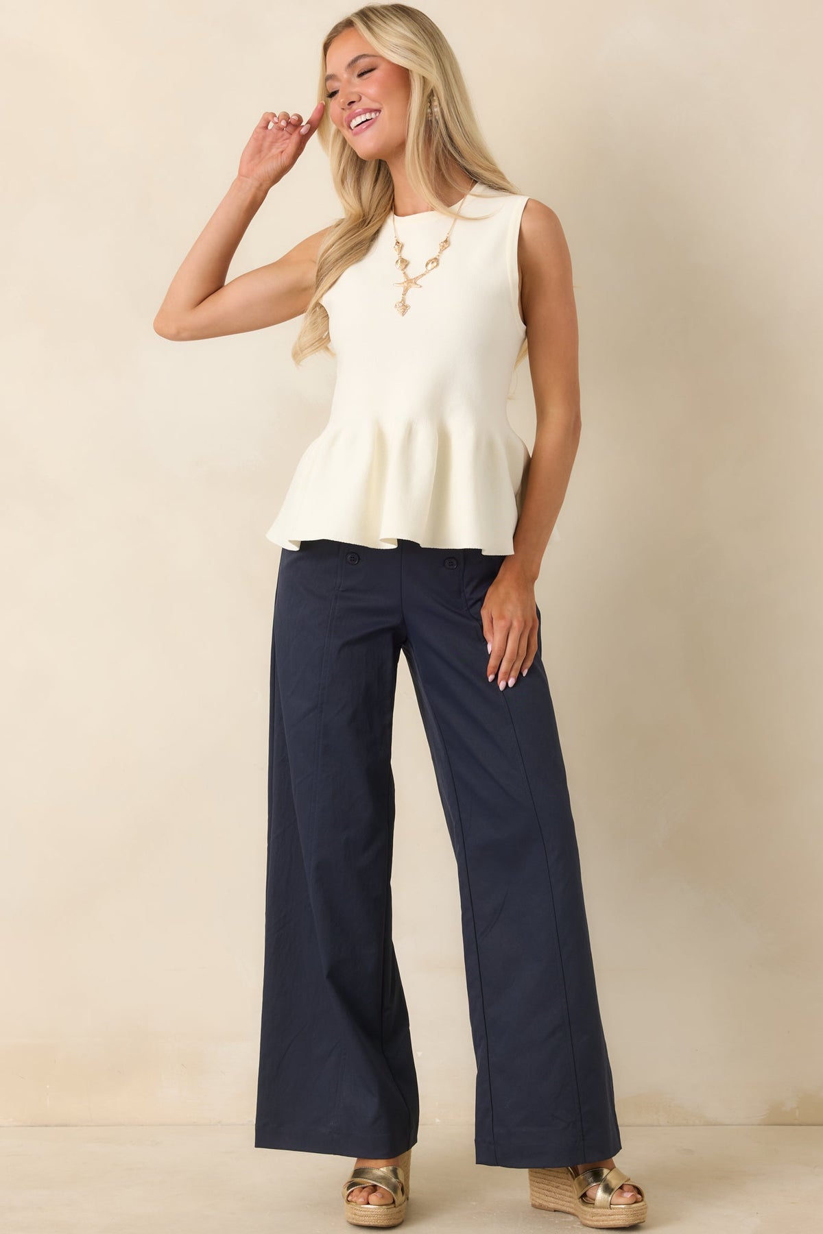 It Just Works Ivory Knit Sleeveless Peplum Top